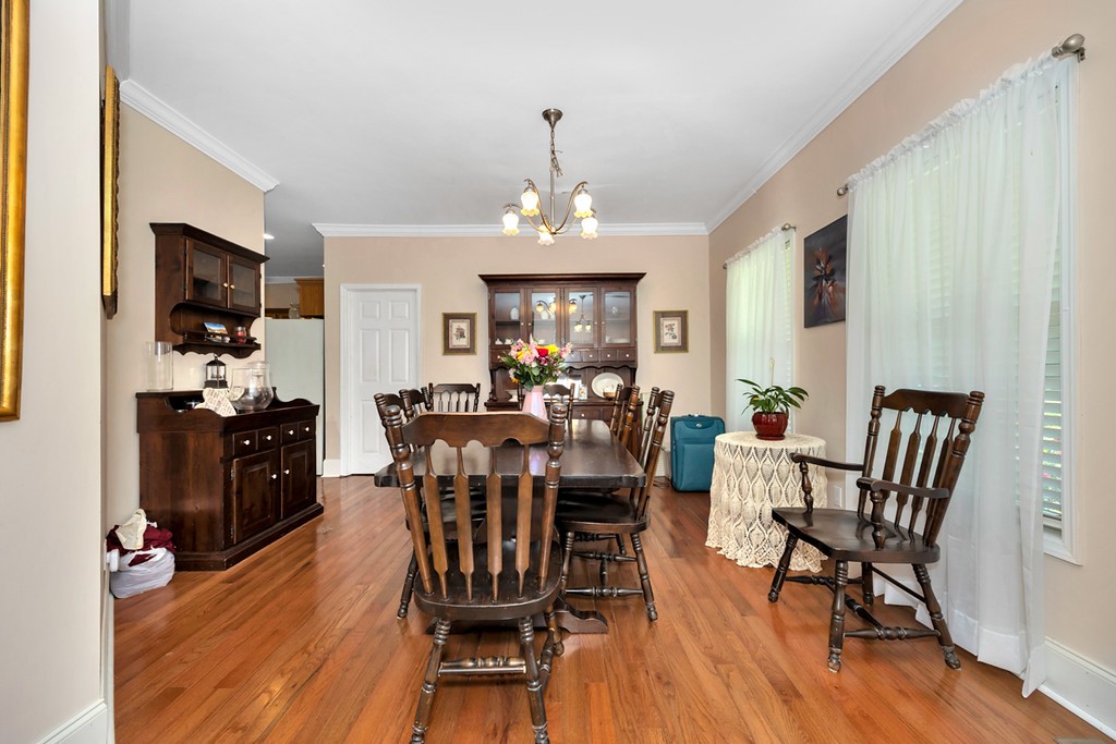 84 Scott Orchard Road Taft, TN 38488 - Photo 11 of 23 a view of a dining room with furniture window and wooden floor