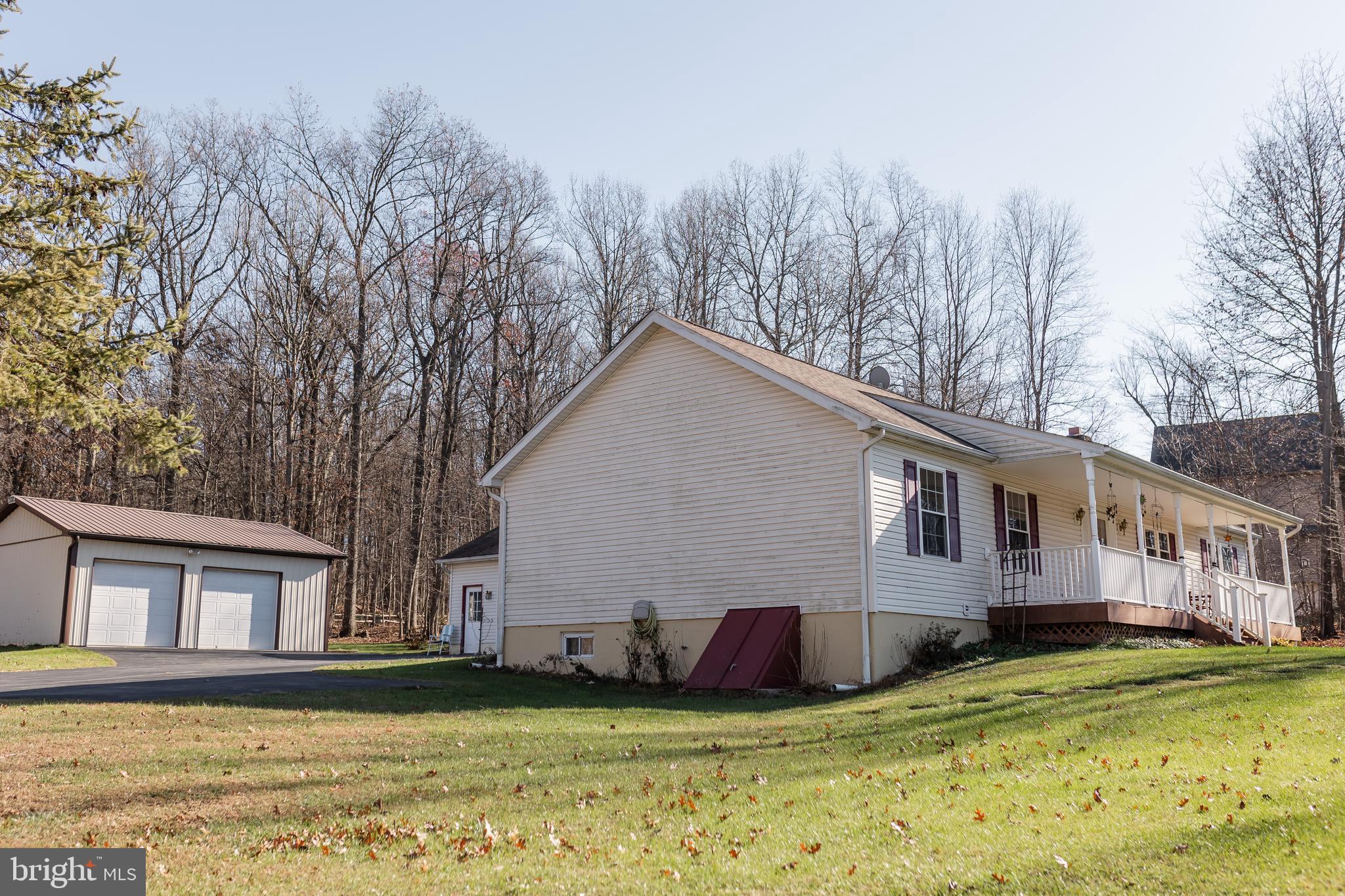 100 Baldwin Road Coatesville, PA 19320 - Photo 3 of 60 a view of a house with a big yard and large trees