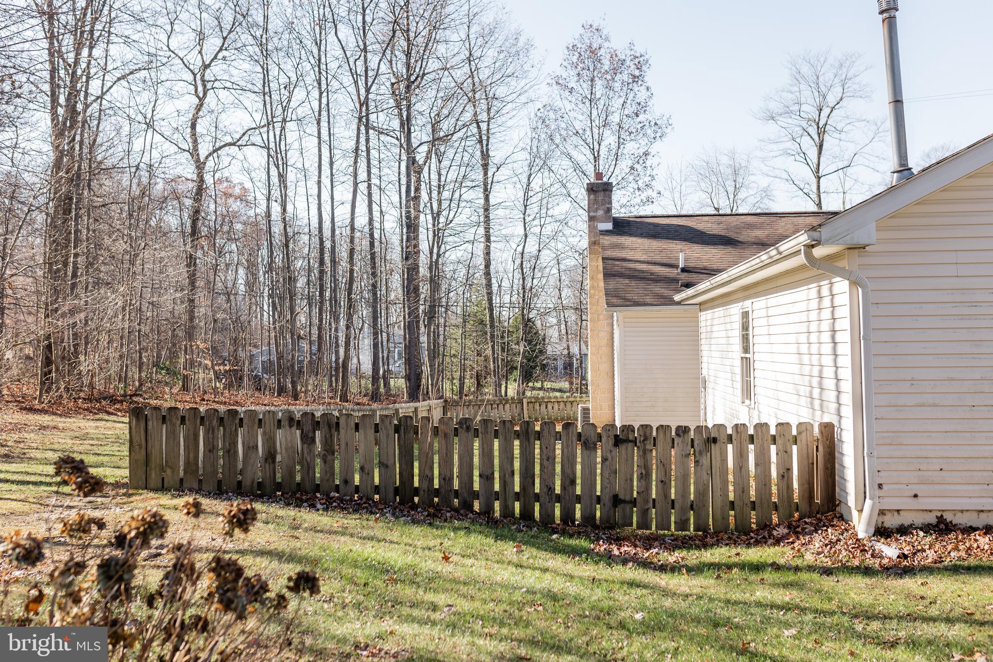 100 Baldwin Road Coatesville, PA 19320 - Photo 54 of 60 a view of a backyard with wooden fence