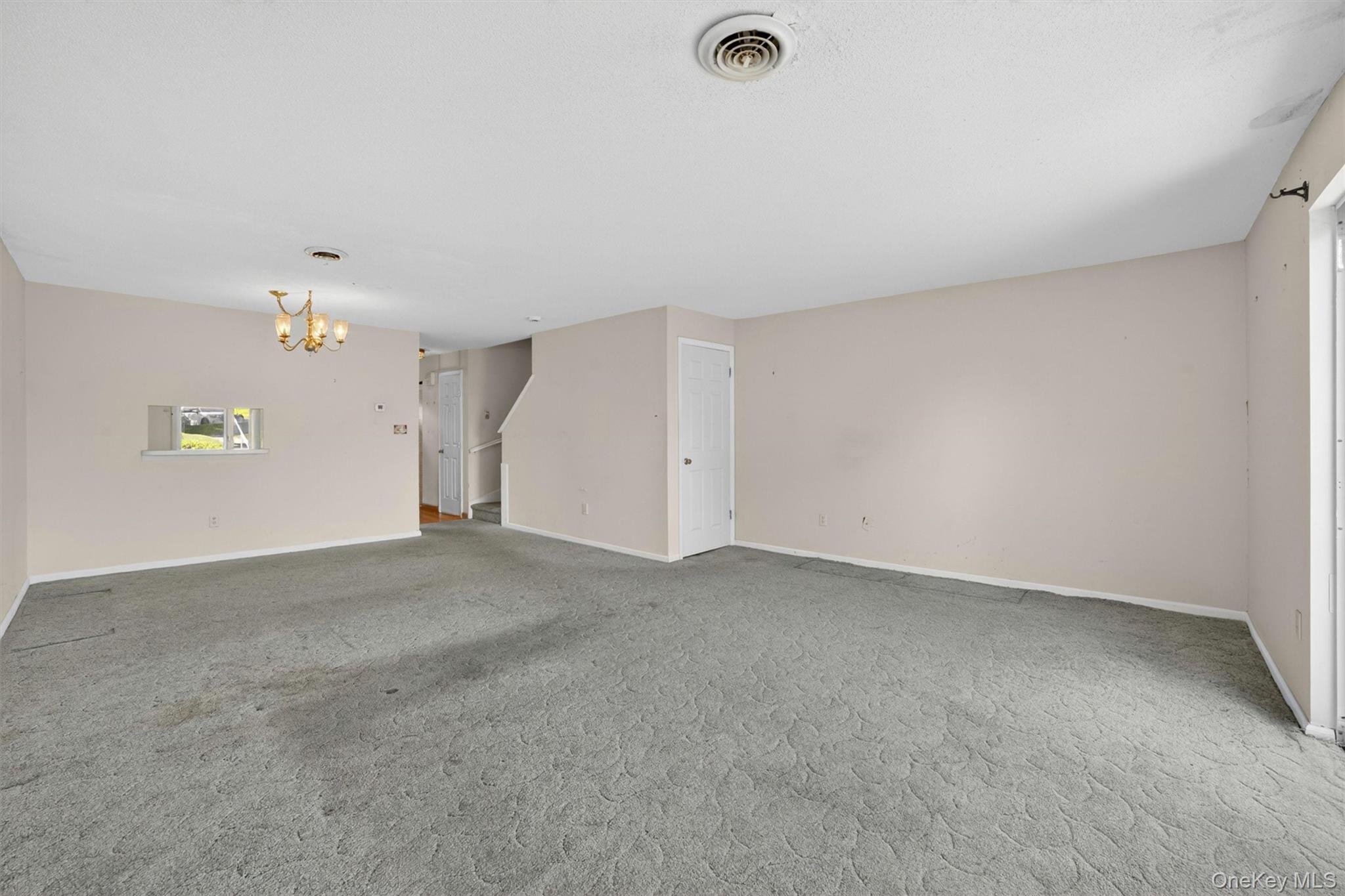 116 Fields Lane Peekskill, NY 10566 - Photo 11 of 40 a view of an empty room