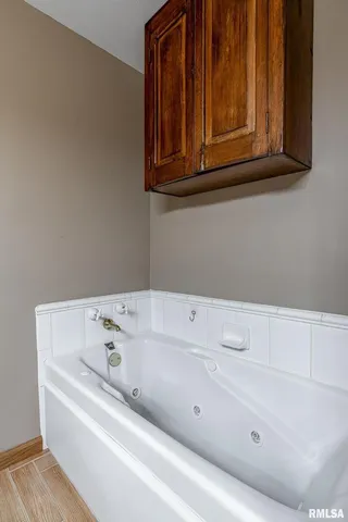 a bathroom with a bathtub