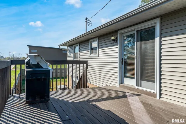 a backyard of a house with seating space