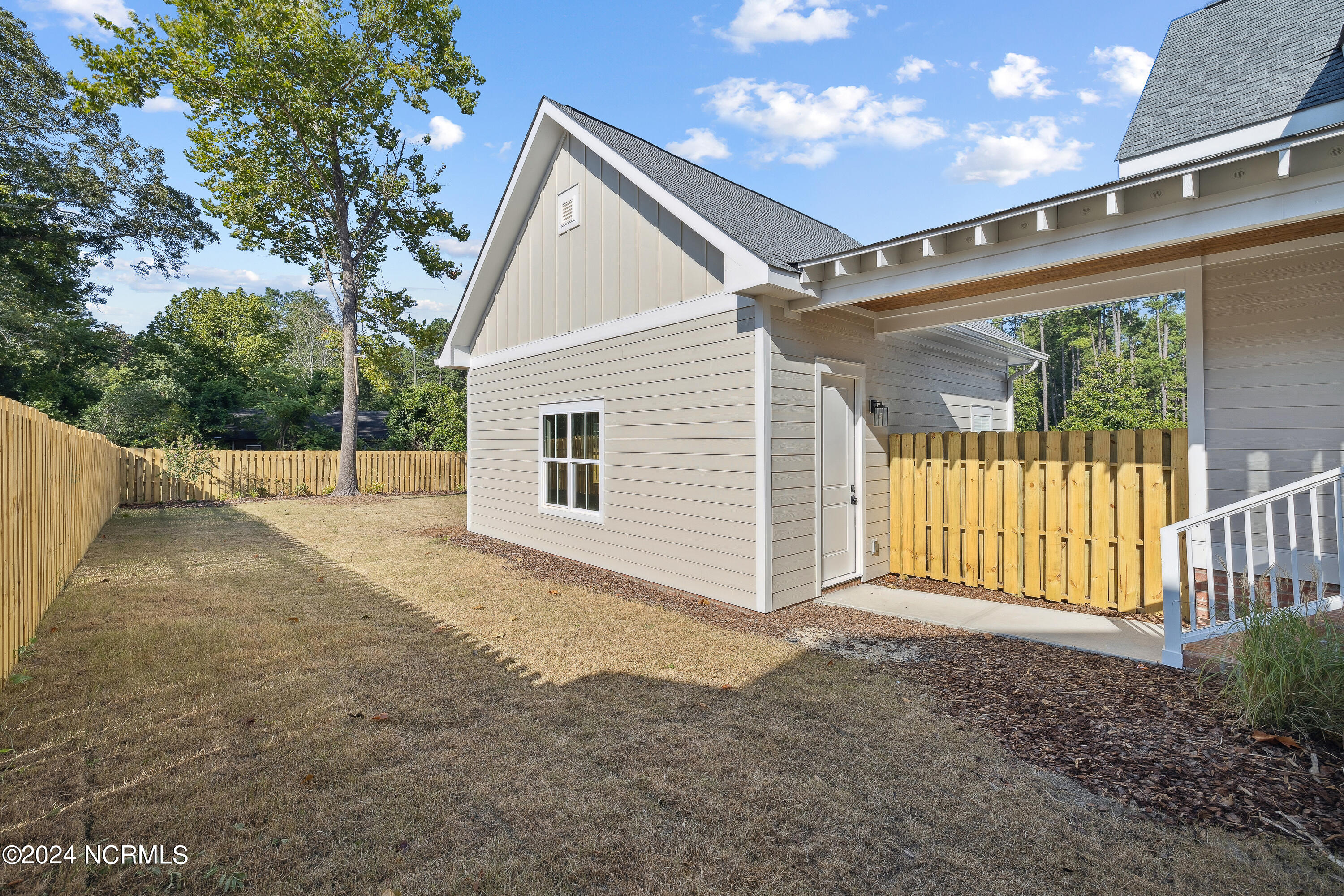 450 Yadkin Road Southern Pines, NC 28387 - Photo 7 of 48 Back Yard 5 (1)