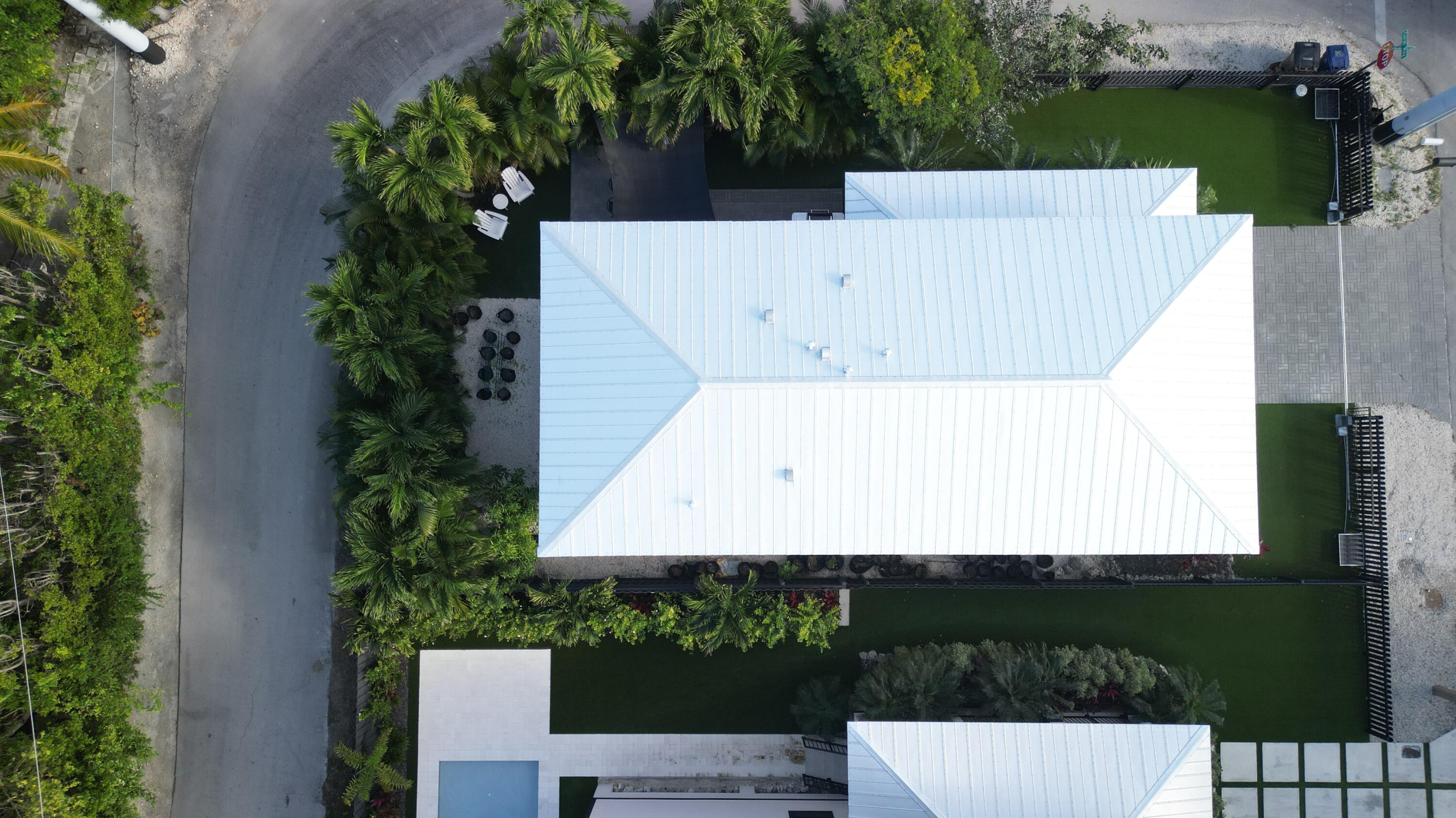 13 Coral Way Key Largo, FL 33037 - Photo 25 of 34 an aerial view of a house with a yard