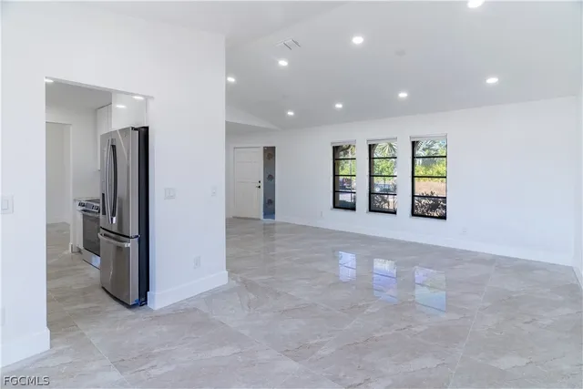 an empty room with windows