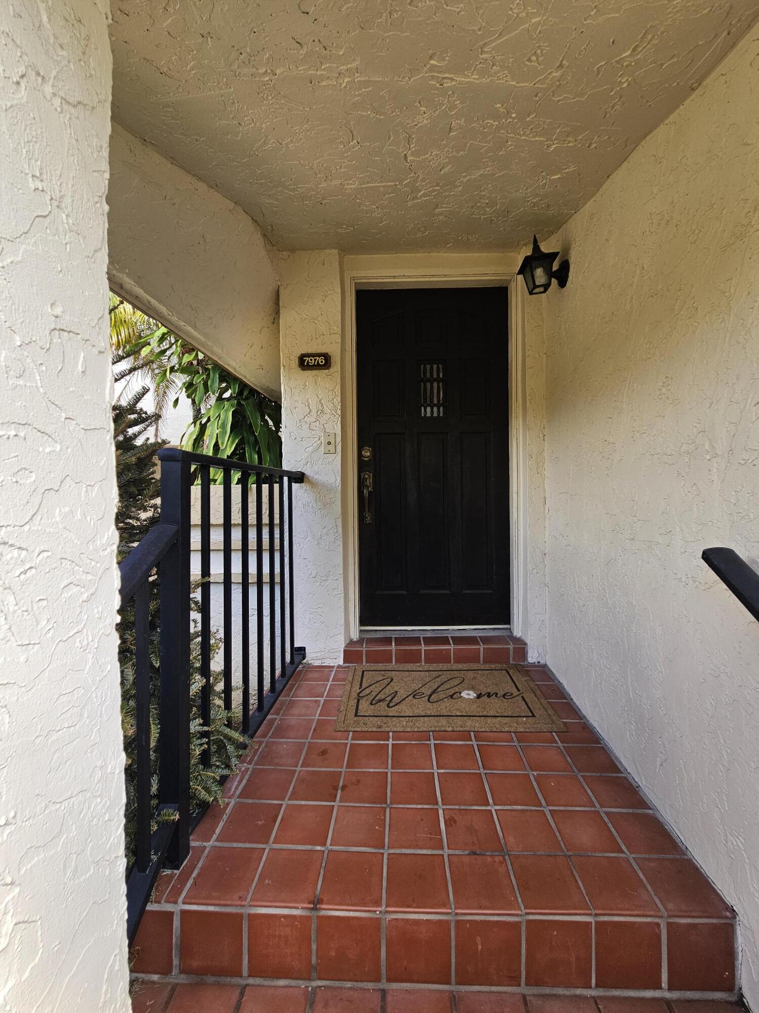 7976 La Mirada Drive Boca Raton, FL 33433 - Photo 2 of 20 ENTRY TO FRONT DOOR