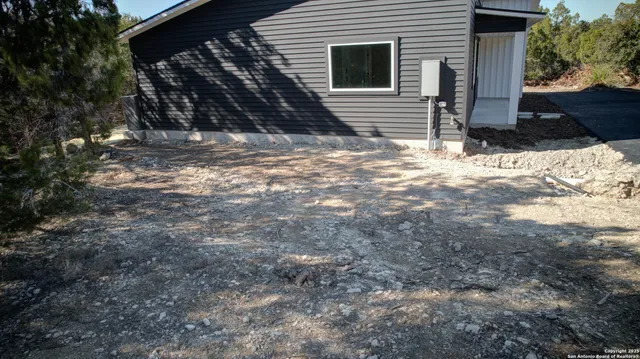 a view of empty room with trees