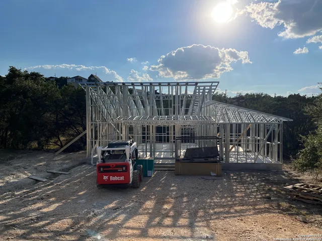 a view of roof deck with furniture