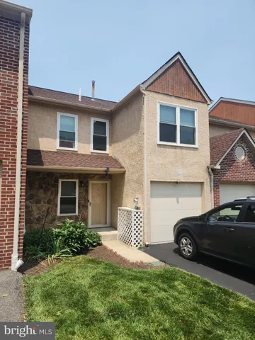 a car parked in front of a house