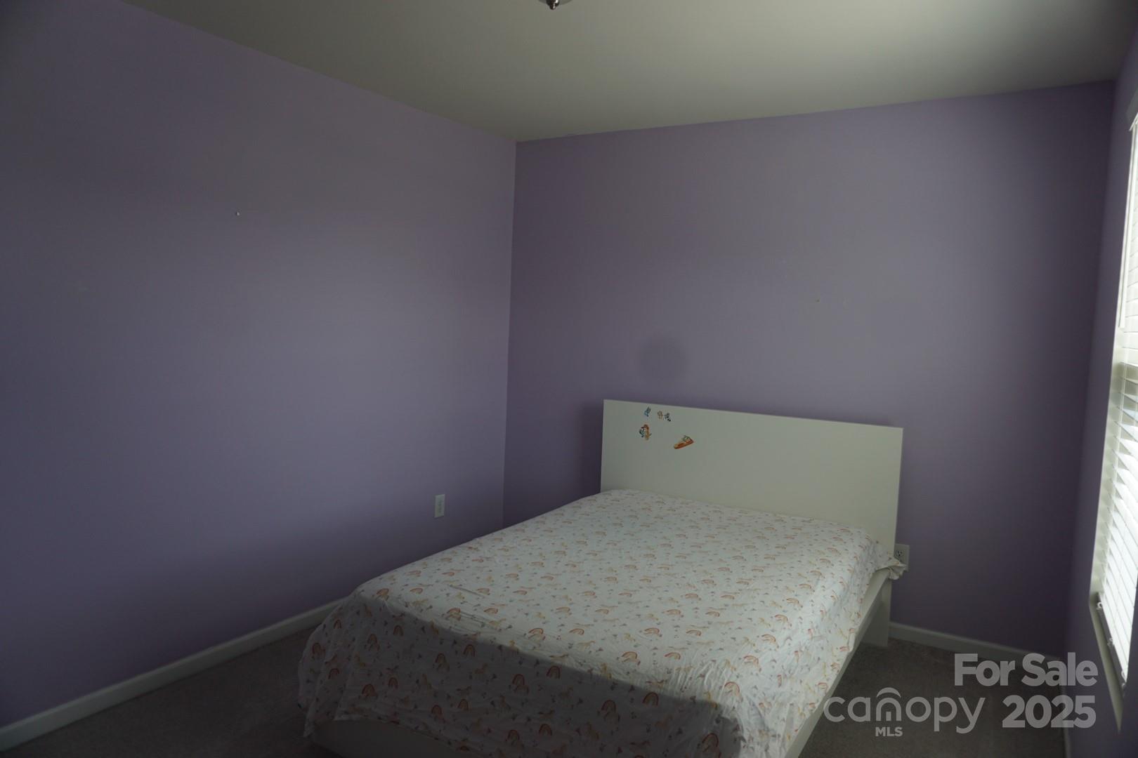 1276 Bryson Lane Denver, NC 28037 - Photo 12 of 16 a bed room with a bed