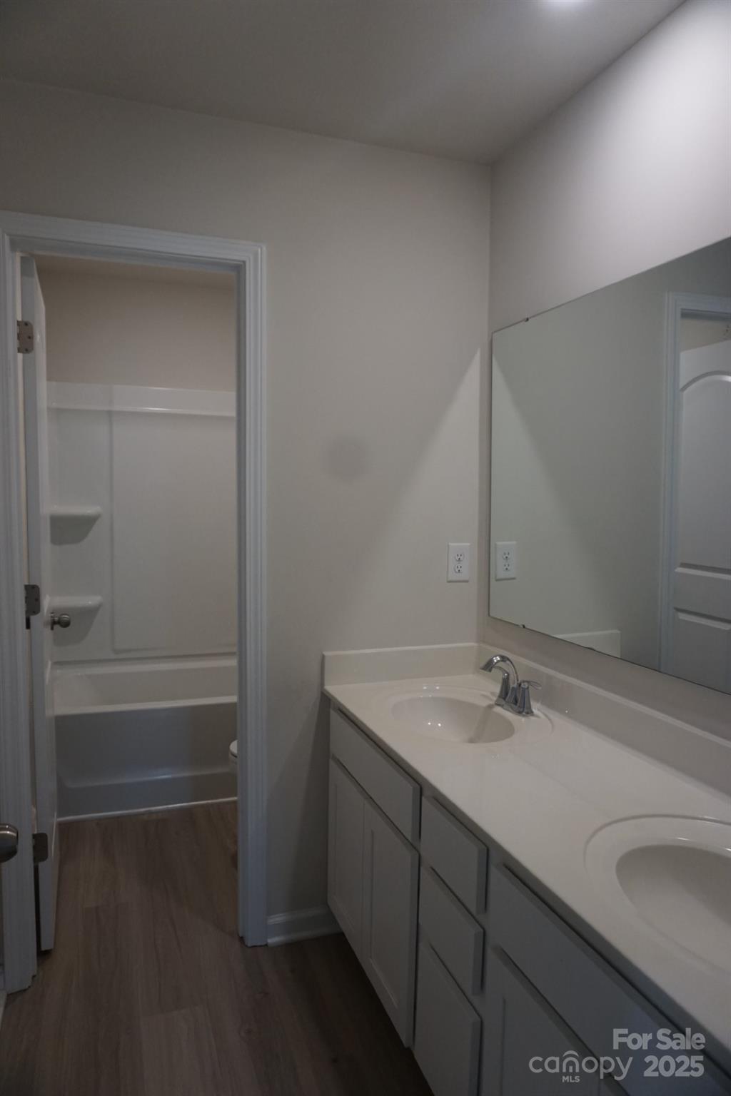 1276 Bryson Lane Denver, NC 28037 - Photo 14 of 16 a bathroom with a sink and a mirror