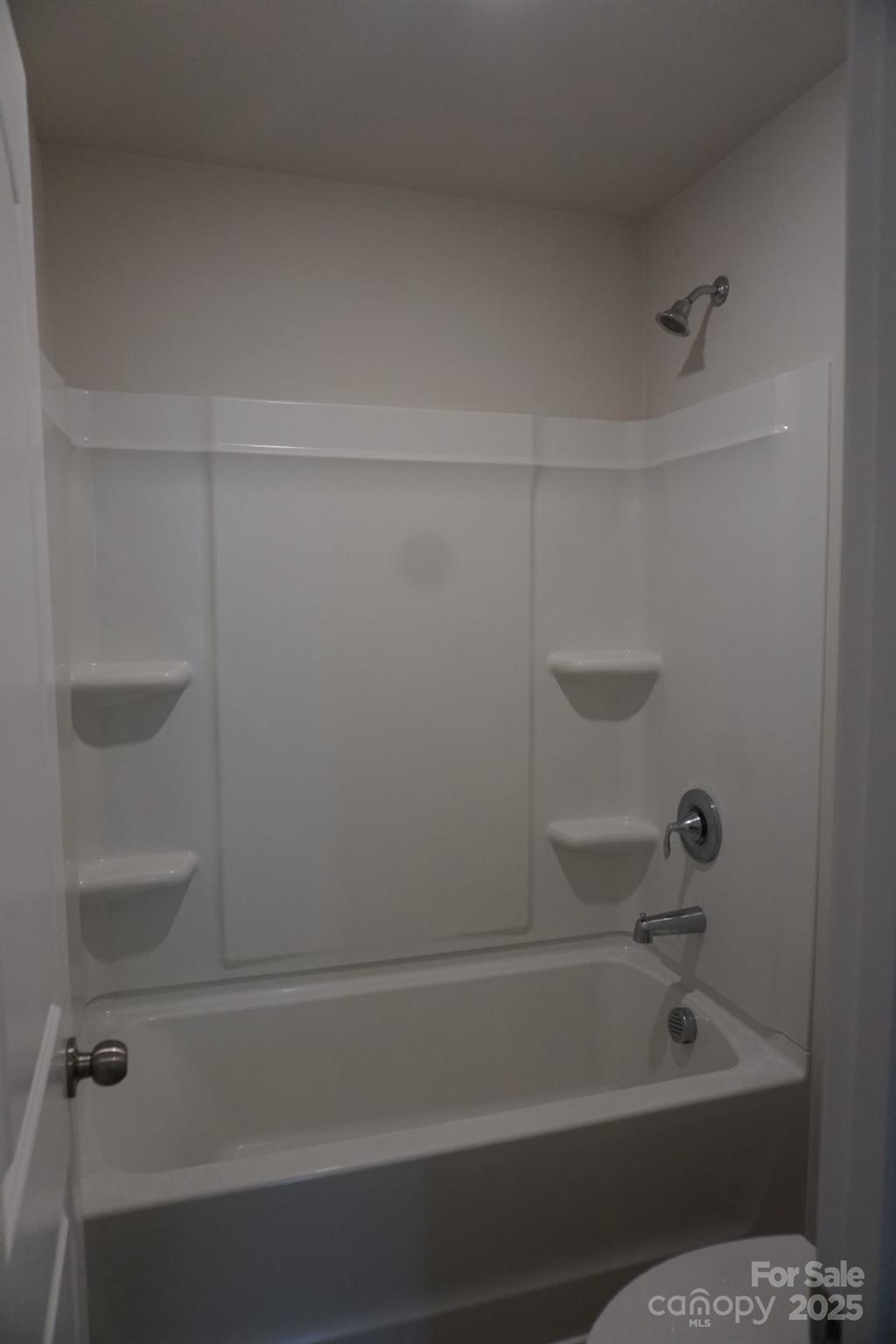 1276 Bryson Lane Denver, NC 28037 - Photo 15 of 16 a bathroom with a bathtub