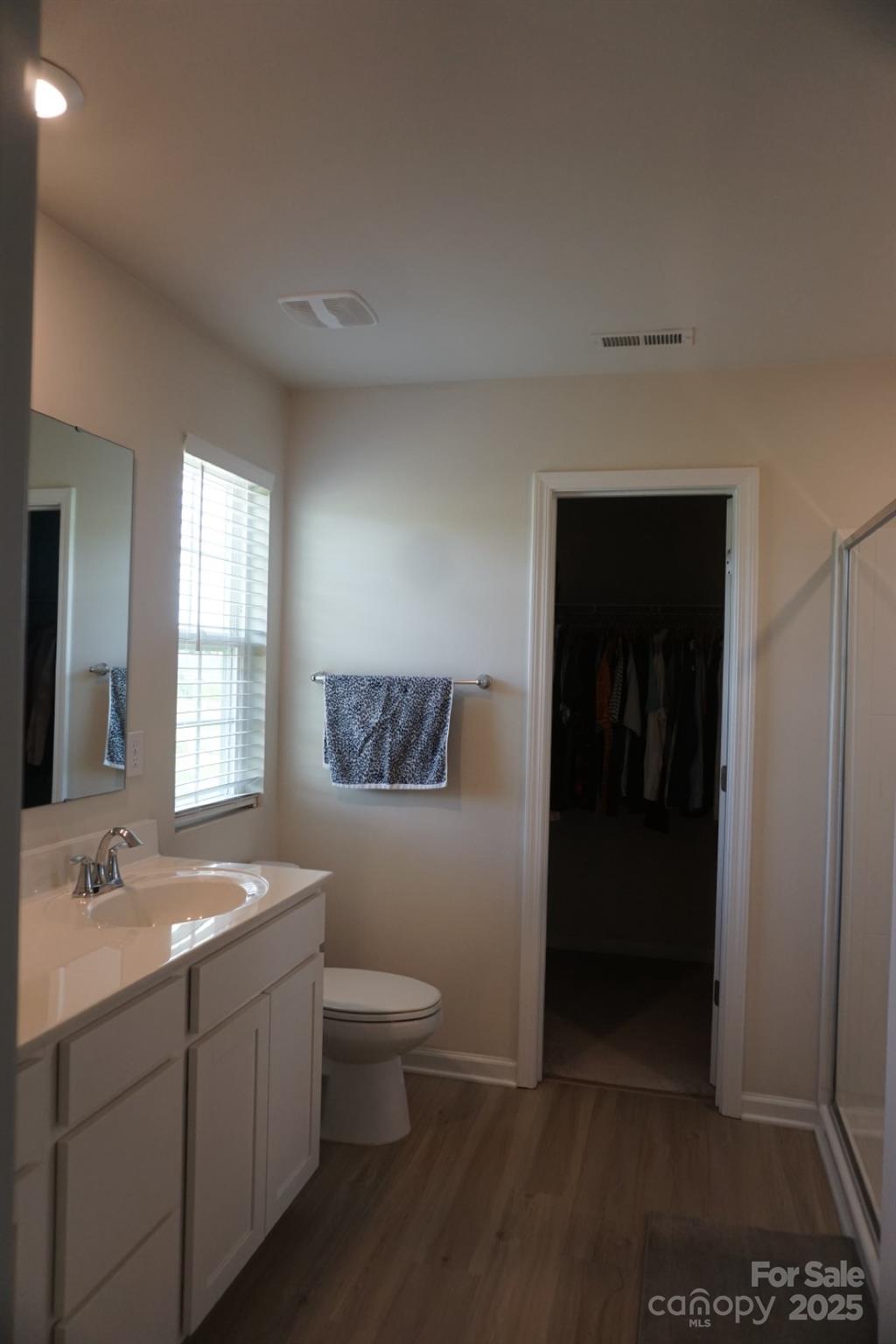 1276 Bryson Lane Denver, NC 28037 - Photo 10 of 16 a bathroom with a sink and a mirror