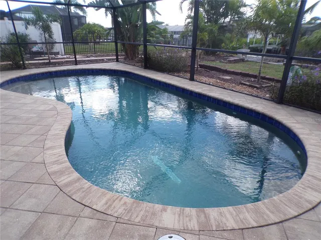 a view of a swimming pool with a sitting space