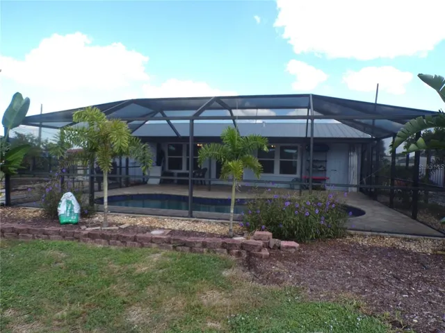 a view of a garden with a fountain