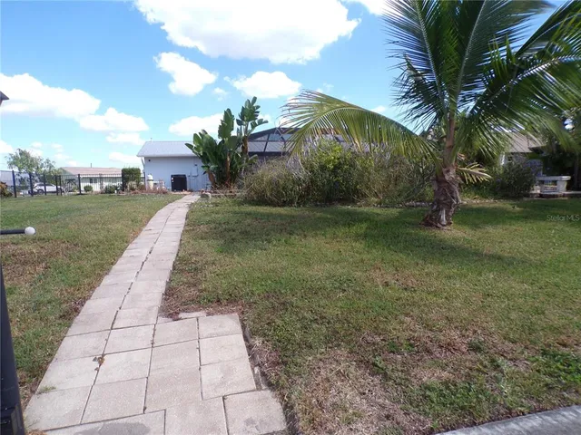 a view of a backyard with a garden