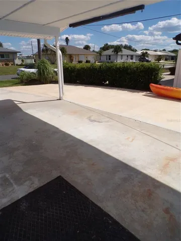 a white toilet sitting next to a bath tub and a shower