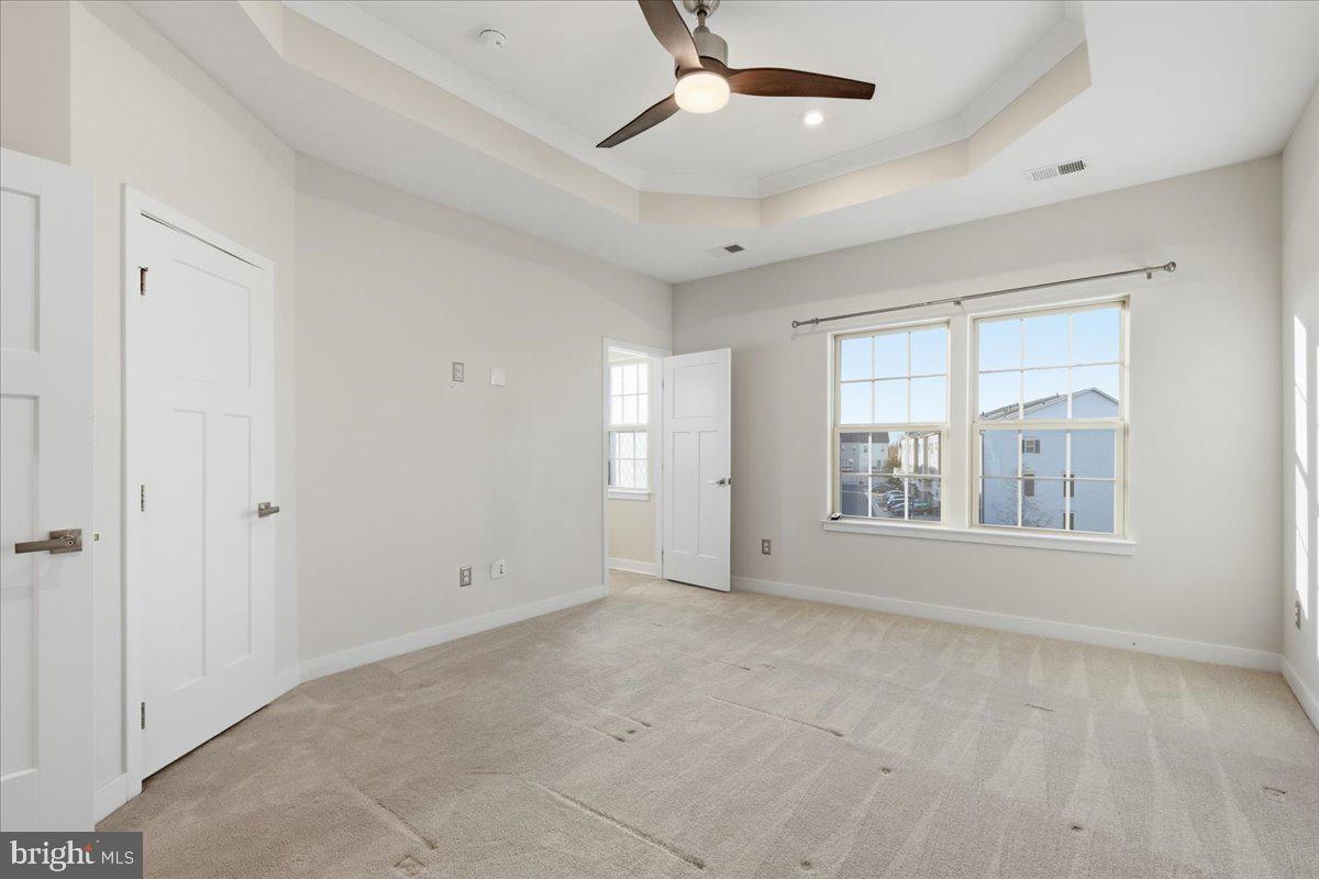 18060 Red Cedar Road Dumfries, VA 22026 - Photo 15 of 39 a view of an empty room with a window