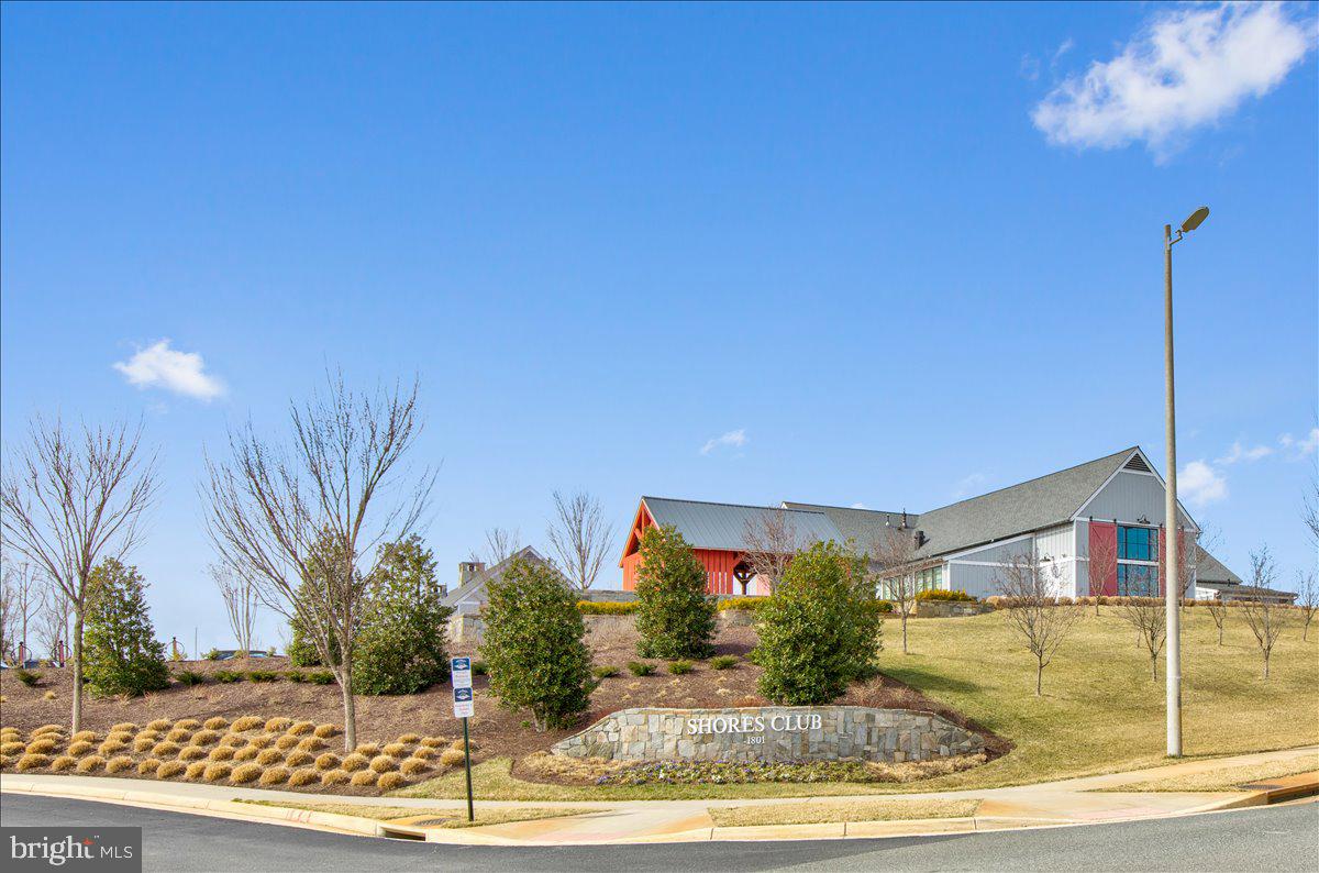 18060 Red Cedar Road Dumfries, VA 22026 - Photo 31 of 39 a view of a house with a swimming pool