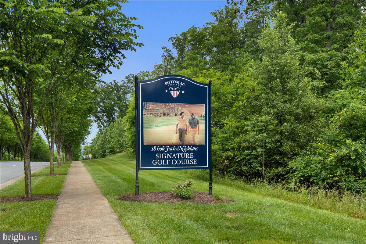18060 Red Cedar Road Dumfries, VA 22026 - Photo 37 of 39 a view of a park that has a sign on it