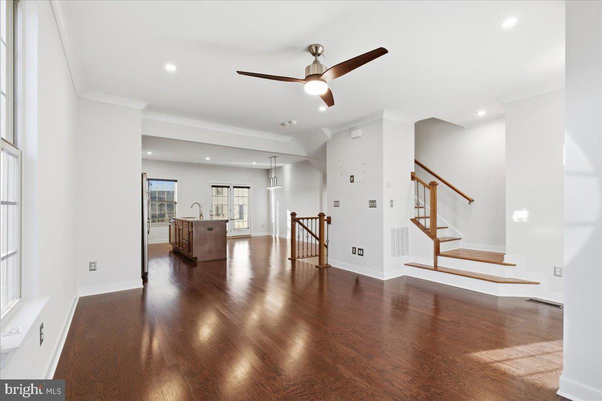 18060 Red Cedar Road Dumfries, VA 22026 - Photo 6 of 39 a view of an entryway with wooden floor