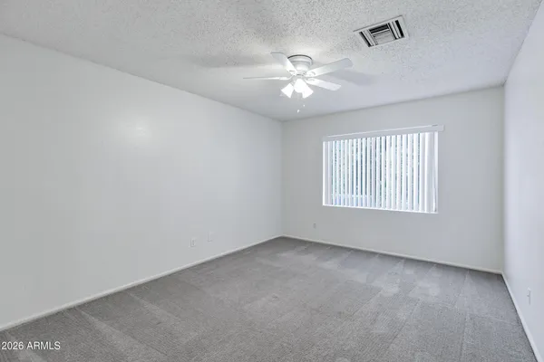 a view of a balcony with chair