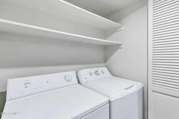 a view of a patio with furniture and a patio