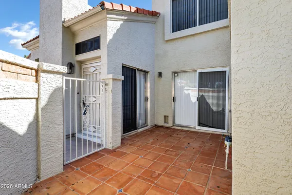 a view of a house with a patio