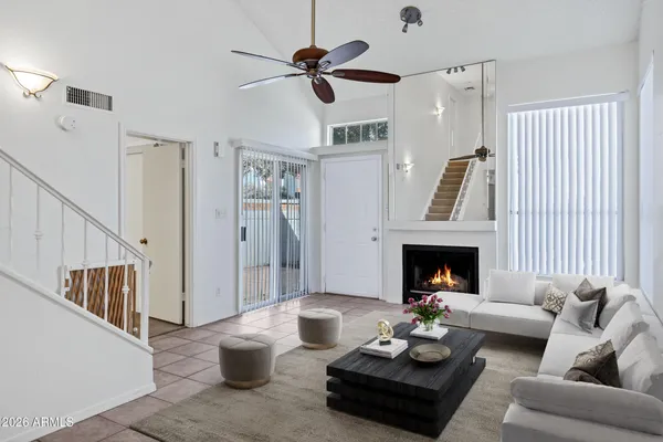 a kitchen with stainless steel appliances a refrigerator sink and microwave