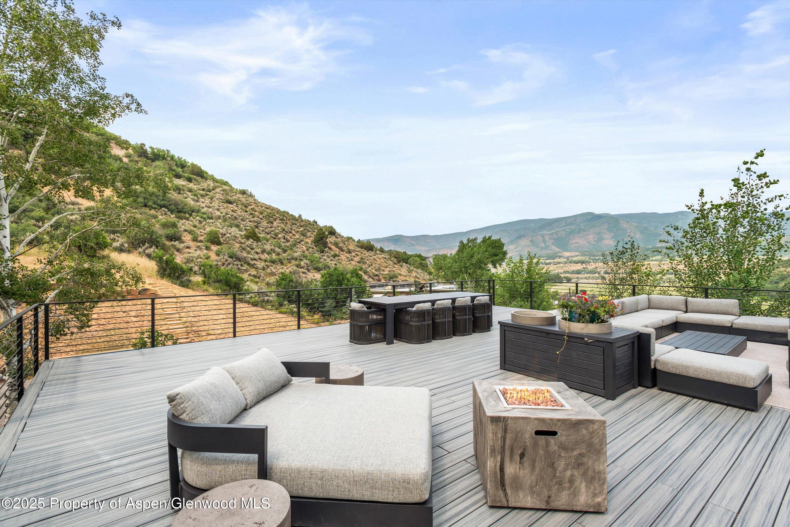 701 Brush Creek Road Aspen, CO 81611 - Photo 3 of 18 a view of a terrace with couches