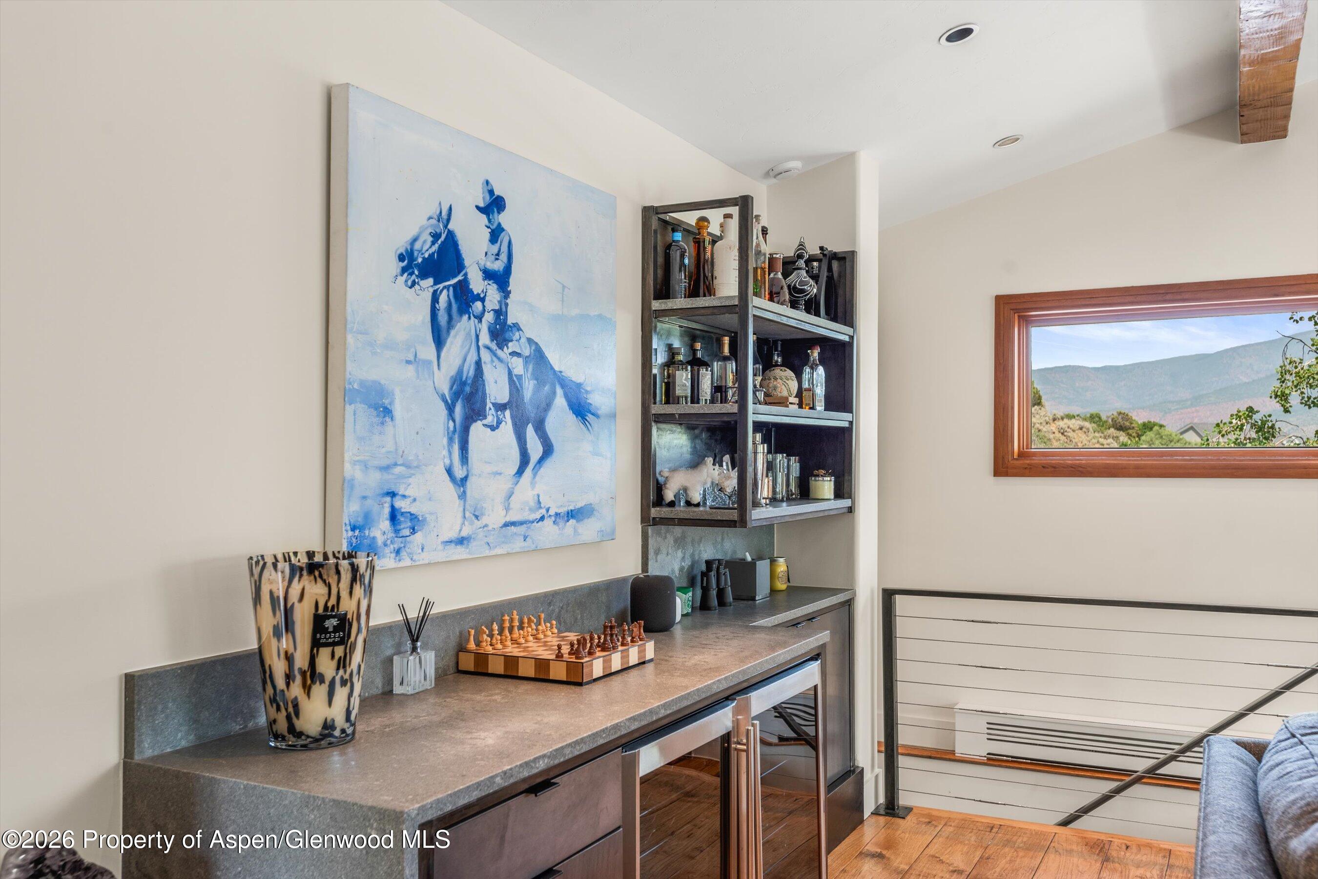 701 Brush Creek Road Aspen, CO 81611 - Photo 9 of 18 a view of a workspace with furniture