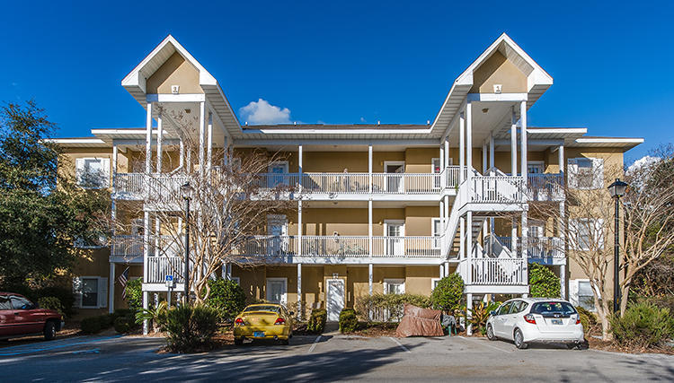 34 Heron's Watch Way, Unit 1304 Santa Rosa Beach, FL 32459 - Photo 15 of 15 a front view of a house with a yard