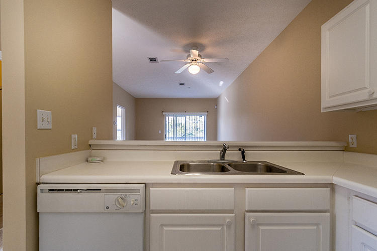 34 Heron's Watch Way, Unit 1304 Santa Rosa Beach, FL 32459 - Photo 5 of 15 a view with a sink and cabinets