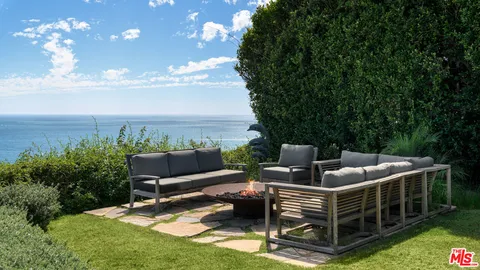 a view of a terrace with chairs