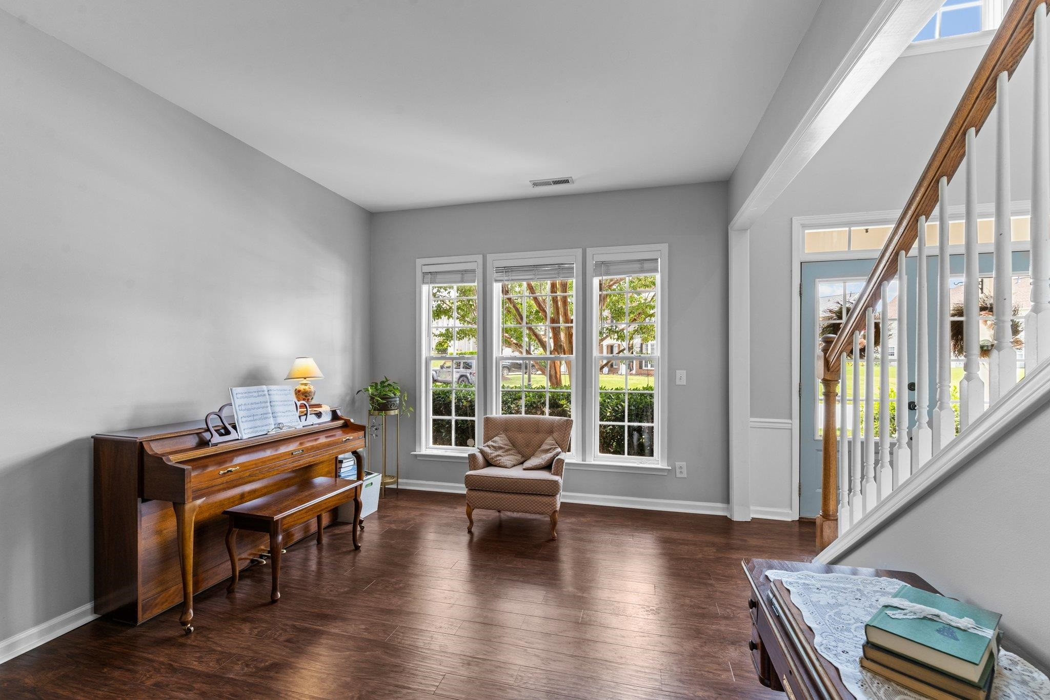 7509 Silver View Lane Raleigh, NC 27613 - Photo 11 of 39 a living room with furniture and a large window