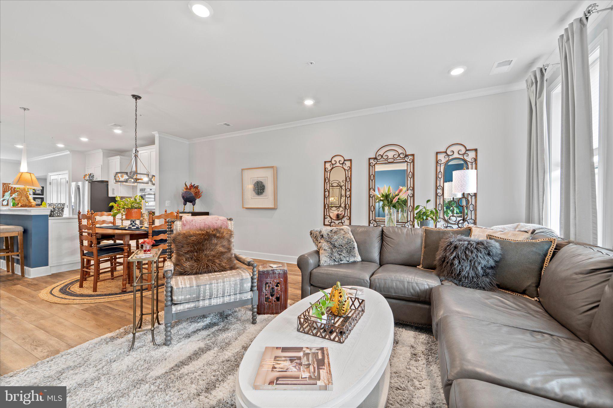 45206 Lettermore Square Sterling, VA 20166 - Photo 14 of 42 a living room with furniture and a wooden floor
