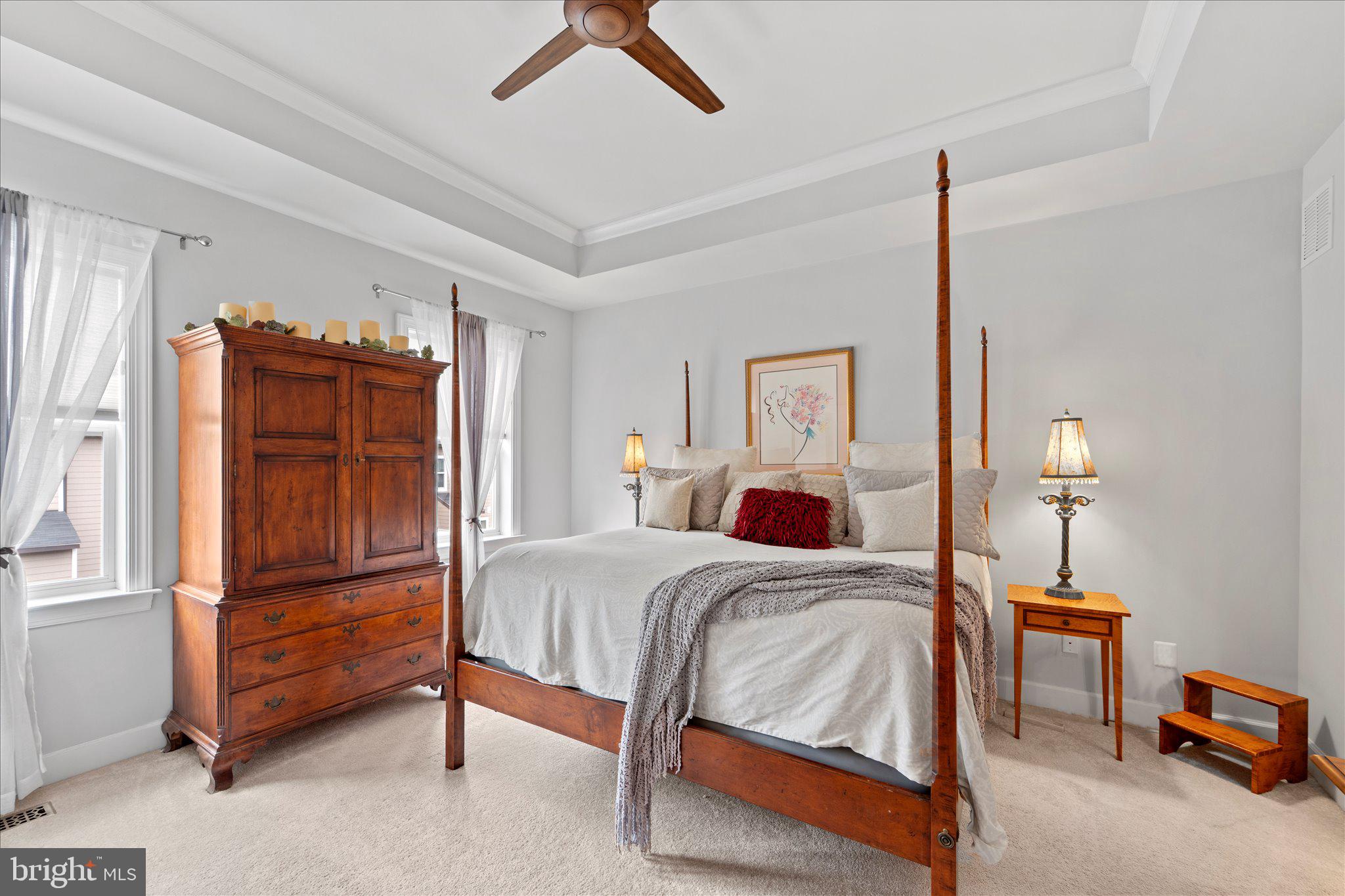 45206 Lettermore Square Sterling, VA 20166 - Photo 22 of 42 a bedroom with a bed and a cabinets