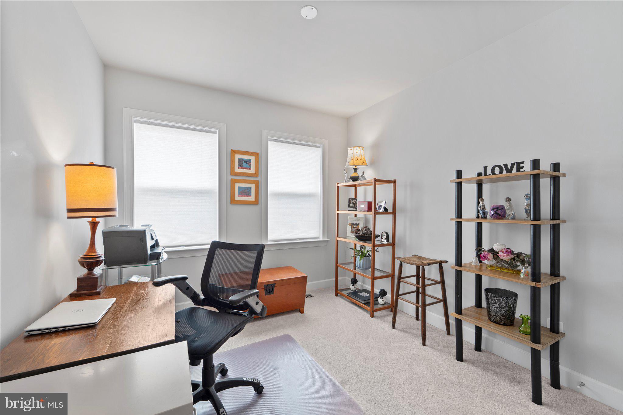 45206 Lettermore Square Sterling, VA 20166 - Photo 26 of 42 a view of a workspace with furniture and a window