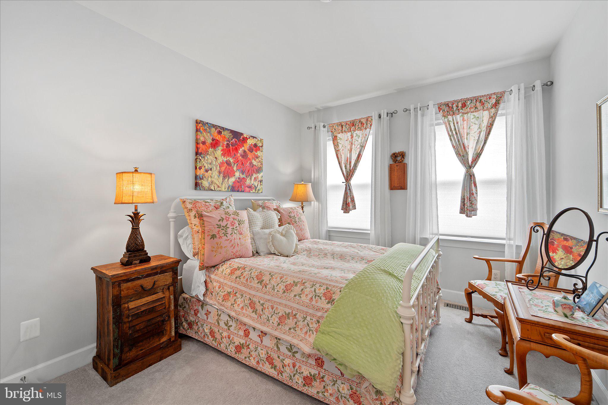 45206 Lettermore Square Sterling, VA 20166 - Photo 28 of 42 a bedroom with a bed and a window