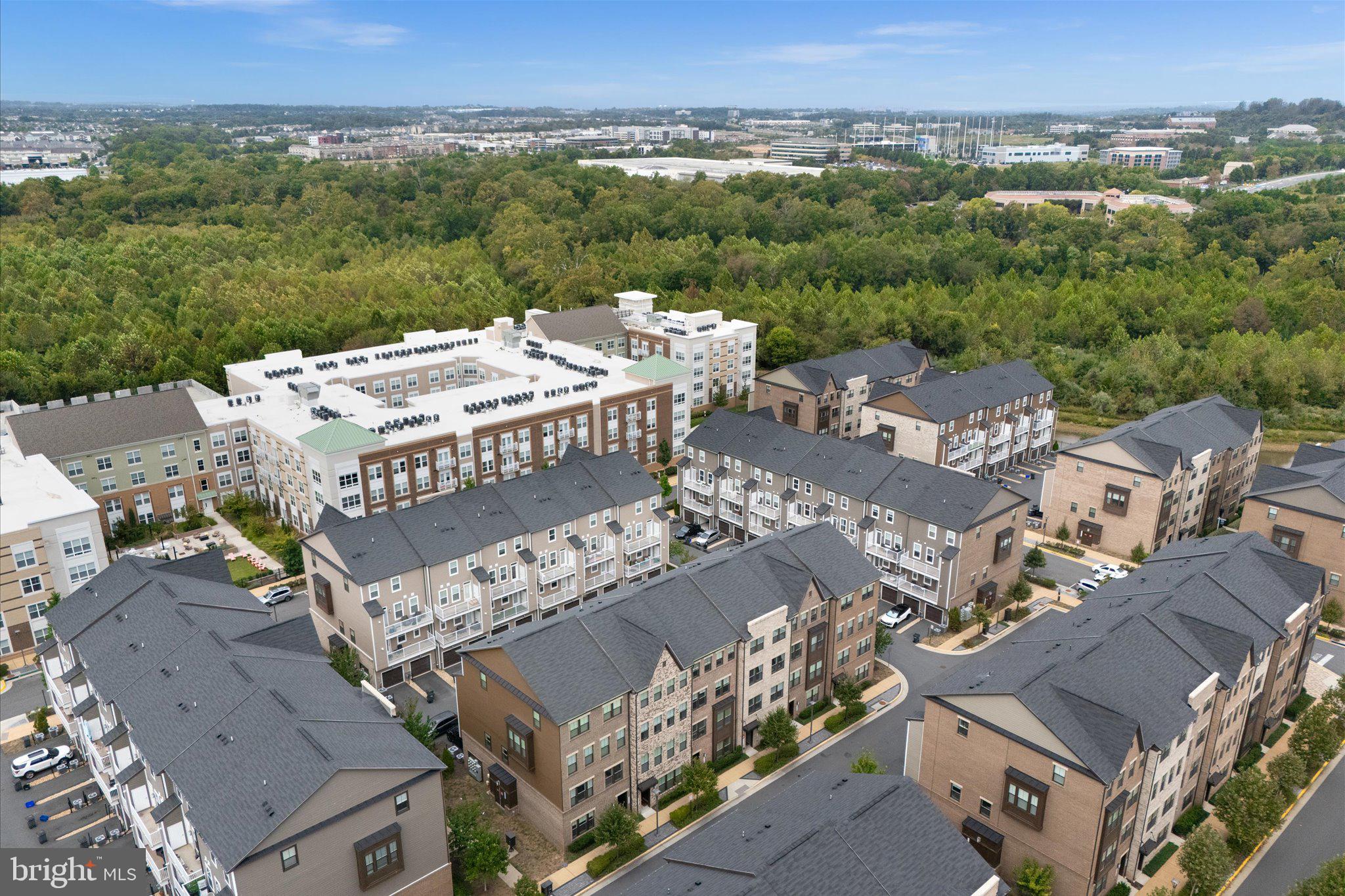 45206 Lettermore Square Sterling, VA 20166 - Photo 36 of 42 an aerial view of a house with a mountain view
