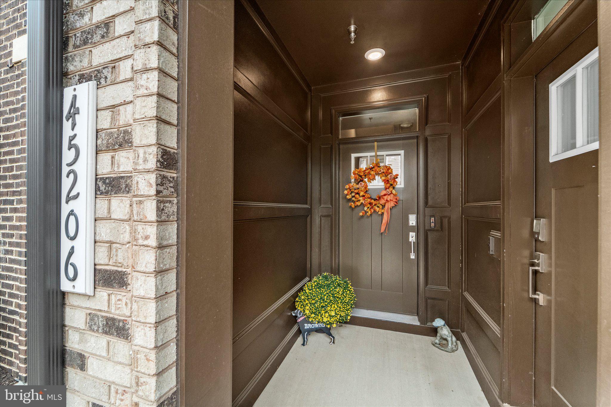 45206 Lettermore Square Sterling, VA 20166 - Photo 5 of 42 a lobby with furniture and a gate