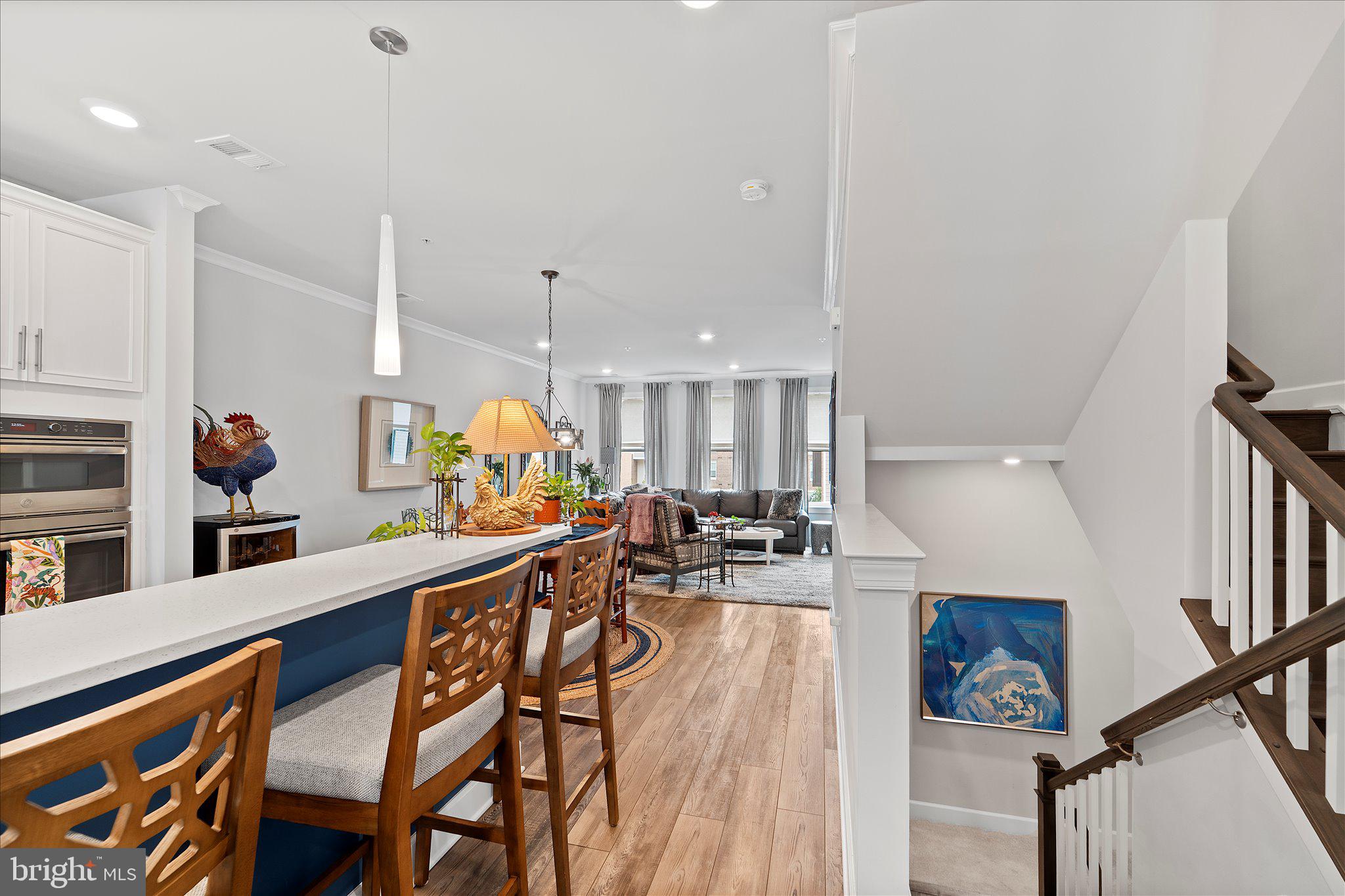 45206 Lettermore Square Sterling, VA 20166 - Photo 6 of 42 a view of a living room and dining room