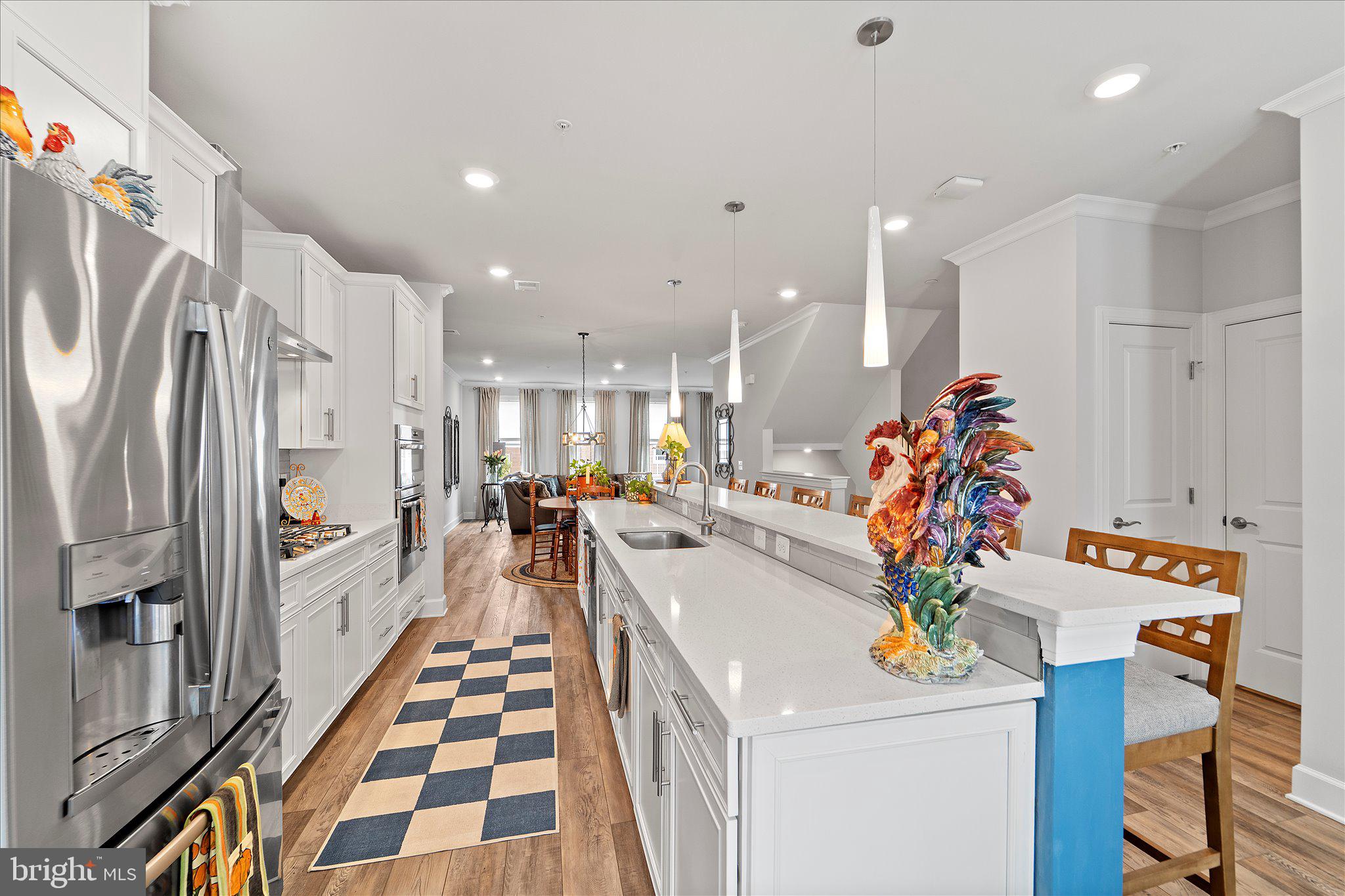 45206 Lettermore Square Sterling, VA 20166 - Photo 8 of 42 a kitchen with stainless steel appliances a refrigerator and a sink