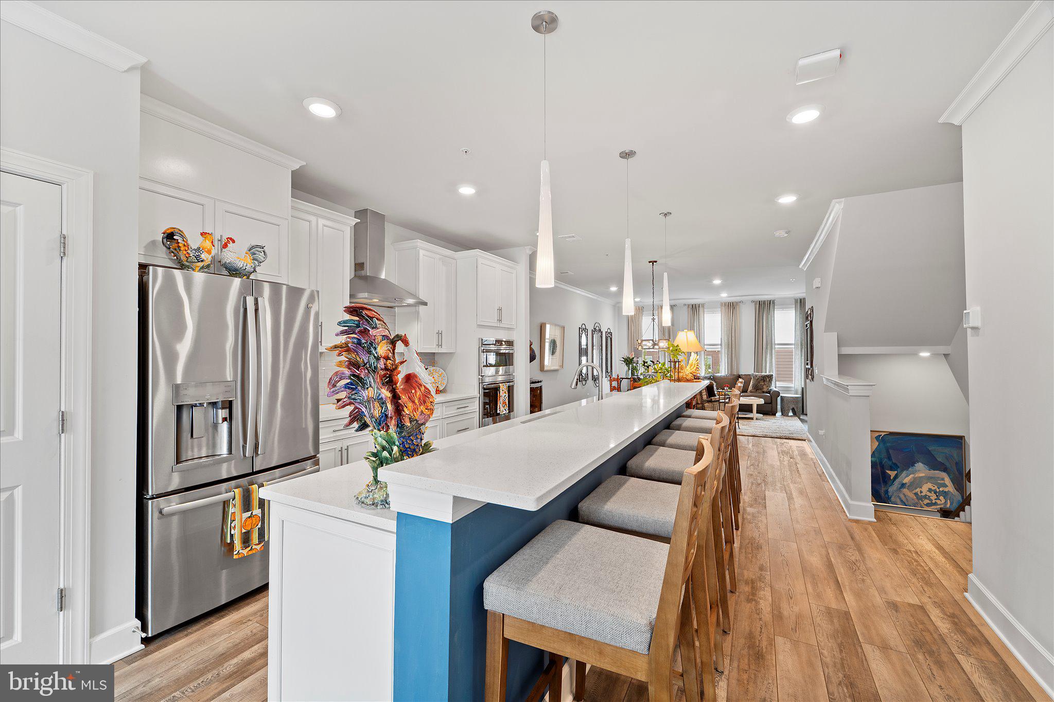 45206 Lettermore Square Sterling, VA 20166 - Photo 9 of 42 a view of a kitchen and dining room