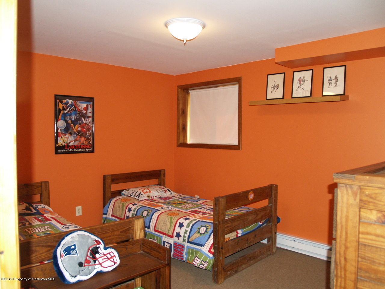 209 Ridgewood Circle Lake Ariel, PA 18436 - Photo 14 of 16 a bedroom with a bed and a table in it