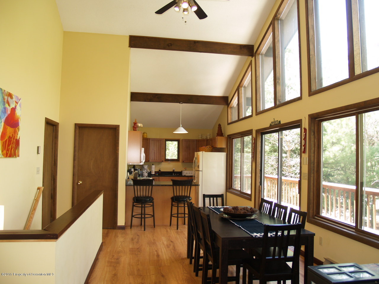 209 Ridgewood Circle Lake Ariel, PA 18436 - Photo 7 of 16 a view of a dining room with furniture window and wooden floor