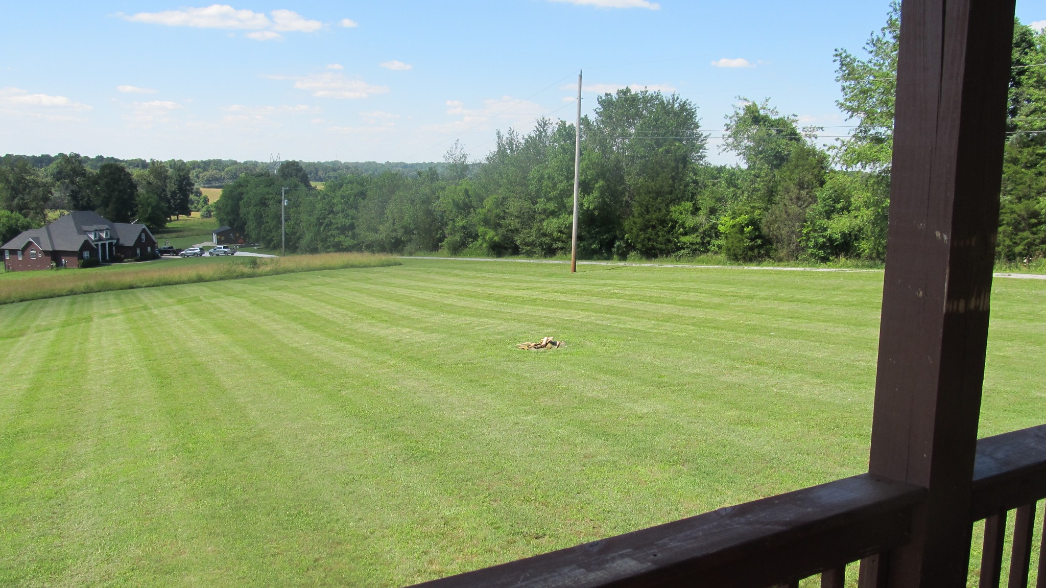 353 7 Mile Ferry Road Cunningham, TN 37052 - Photo 11 of 14 a view of a field with a tree in the background