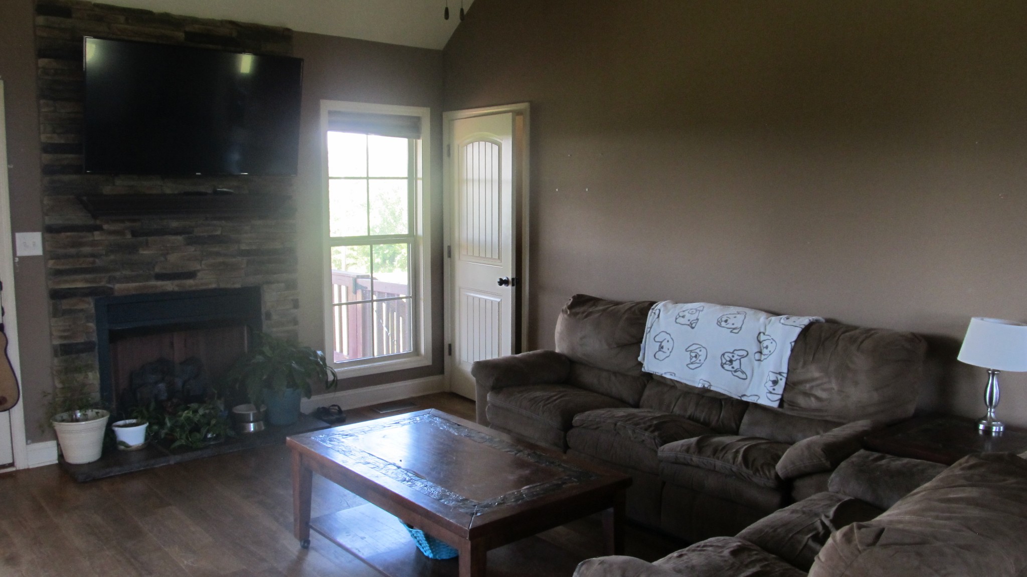 353 7 Mile Ferry Road Cunningham, TN 37052 - Photo 4 of 14 a living room with furniture and a fireplace