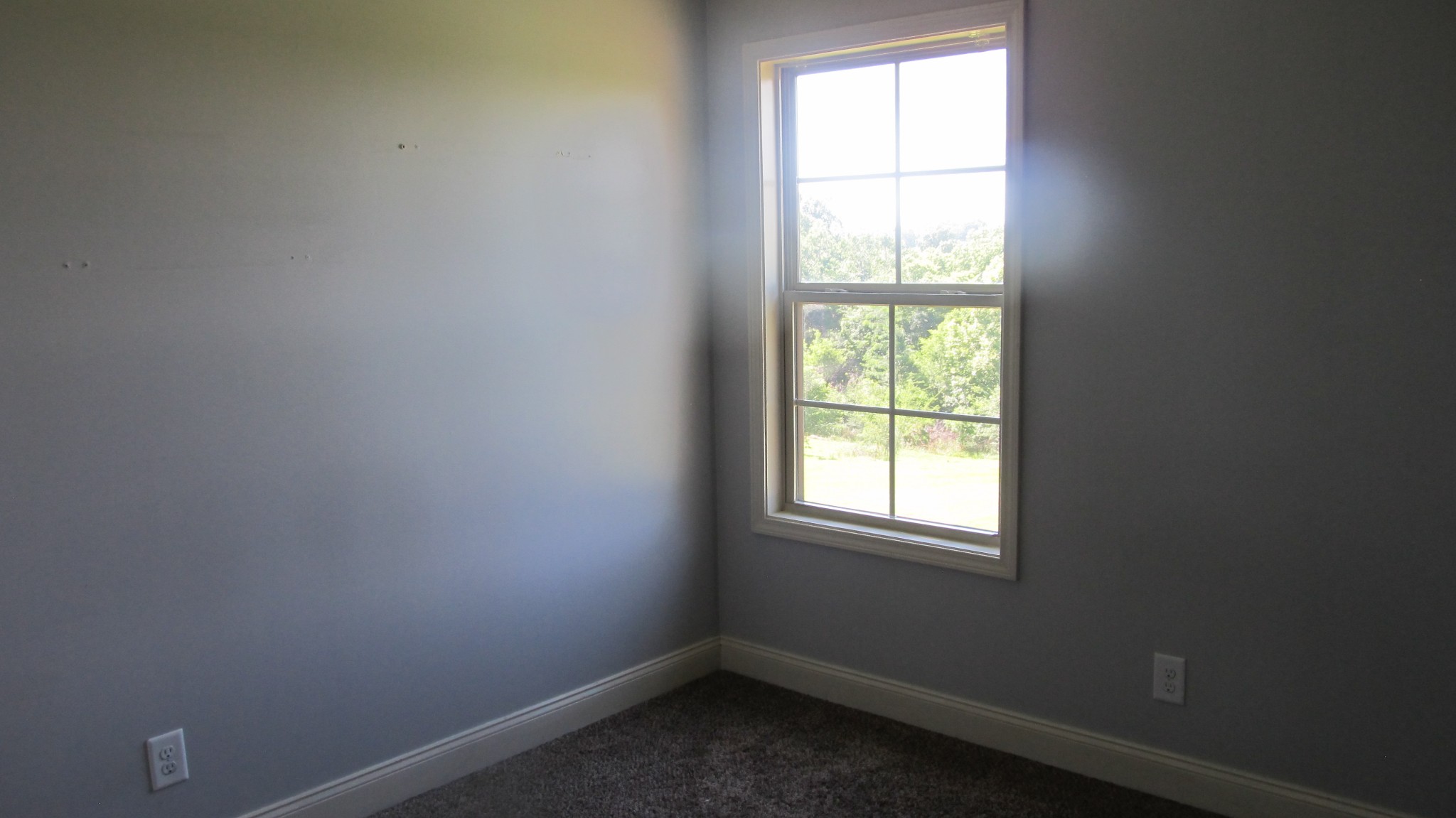 353 7 Mile Ferry Road Cunningham, TN 37052 - Photo 7 of 14 an empty room with a window