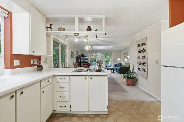 a bedroom with a bed and a table